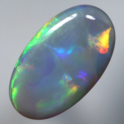 SOLID SEMI BLACK OPAL Neon orange to neon gold contrasted by violet